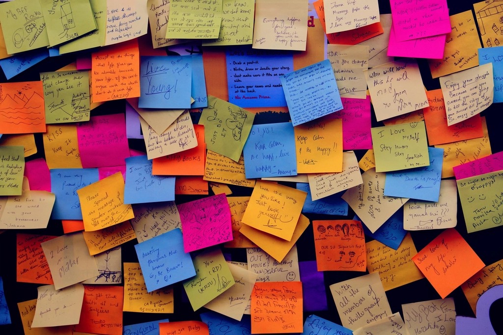 A wall full of colorful sticky notes